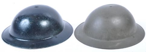 TWO POST WWII BRITISH ARMY STEEL BRODIE HELMETS