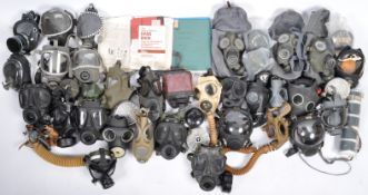 LARGE COLLECTION OF ASSORTED MILITARY RESPIRATOR GAS MASKS