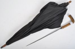 19TH CENTURY VICTORIAN PARASOL WITH CONCEALED BLADE