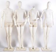 GROUP OF FOUR SHOP DISPLAY ARTICULATED FEMALE MANN