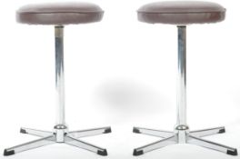 MATCHING PAIR OF CHROME AND FAUX LEATHER STOOLS