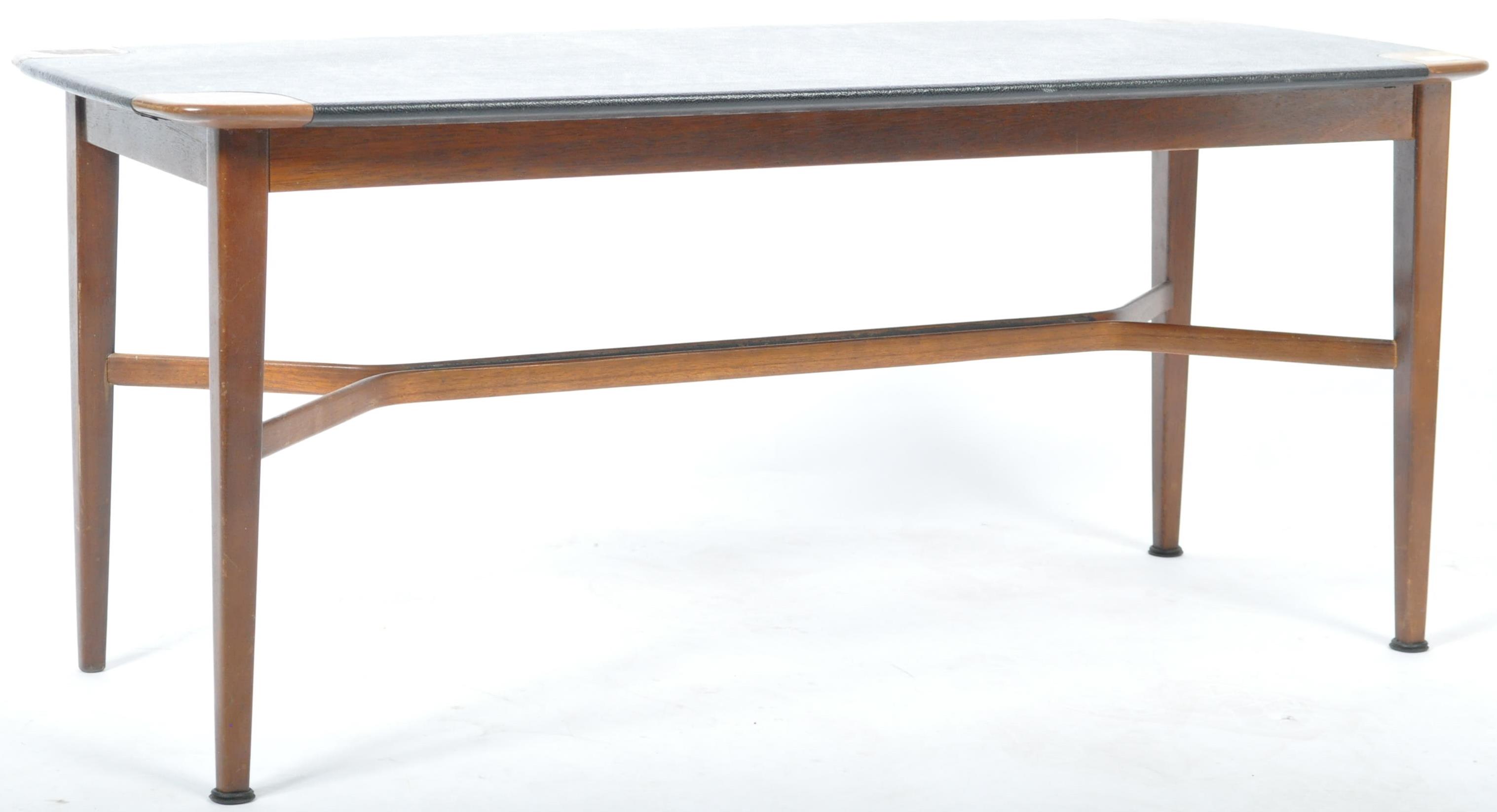 E. GOMME - G-PLAN - MID CENTURY TOLA WOOD AND VINYL COFFEE TABLE