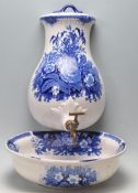ANTIQUE EARLY 20TH CENTURY BLUE AND WHITE CERAMIC WATER VESSELL