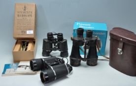 THREE PAIRS OF VINTAGE BINOCULARS AND A STUDENTS MICROSCOPE