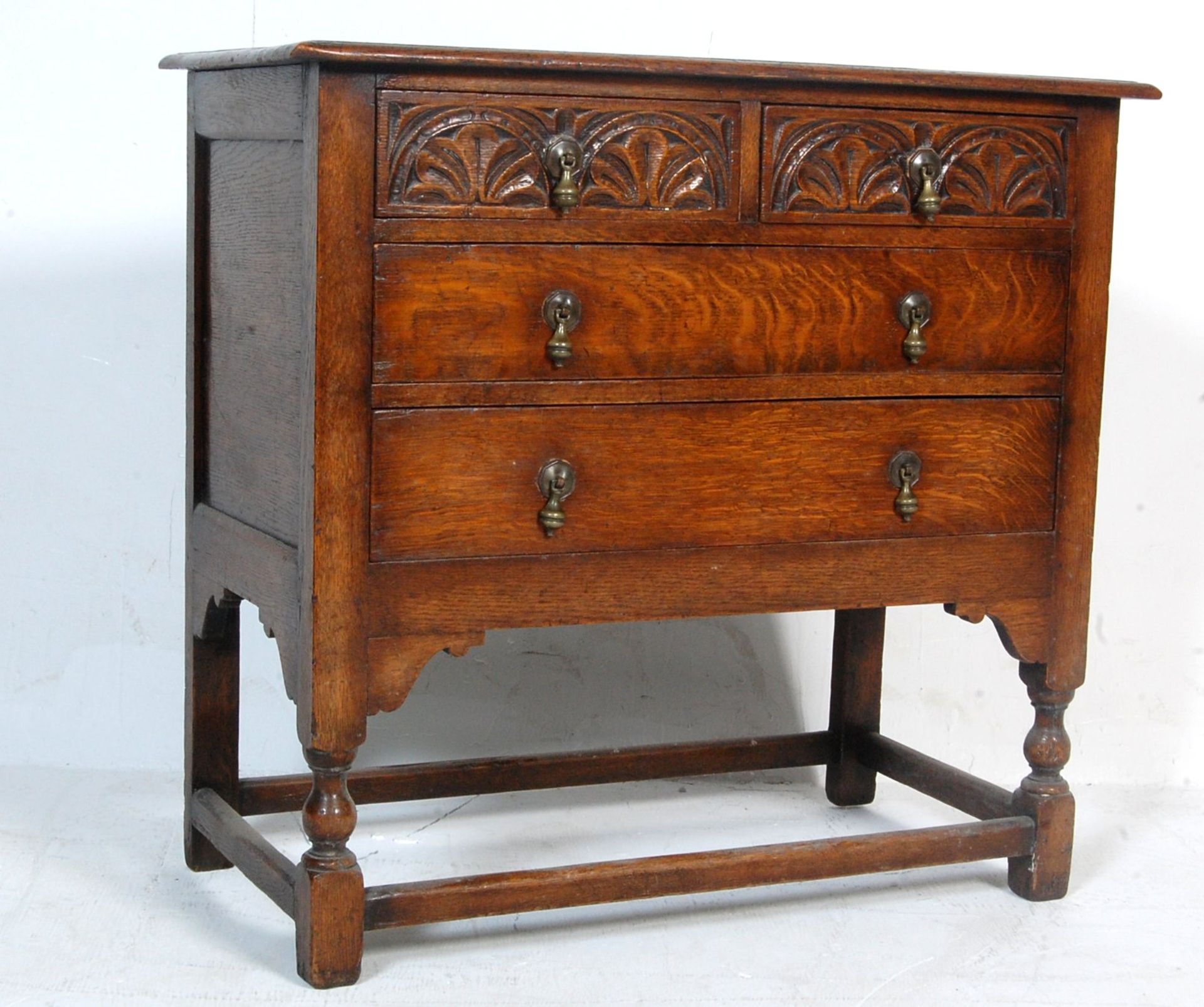 17TH CENTURY REVIVAL CARVED OAK CHEST OF DRAWERS