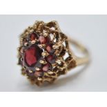 9CT GOLD AND RED STONE CLUSTER RING