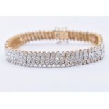 9CT GOLD AND DIAMOND TENNIS BRACELET