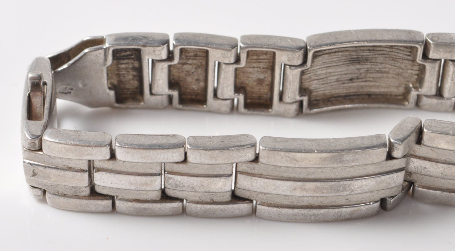 COLLECTION OF THREE SILVER STAMPED 925 BRACELETS. - Image 6 of 7