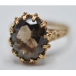1970'S 9CT GOLD AND BROWN STONE RING