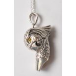 STAMPED 925 / STERLING SILVER WHISTLE PENDANT IN THE FORM OF A PARROT.