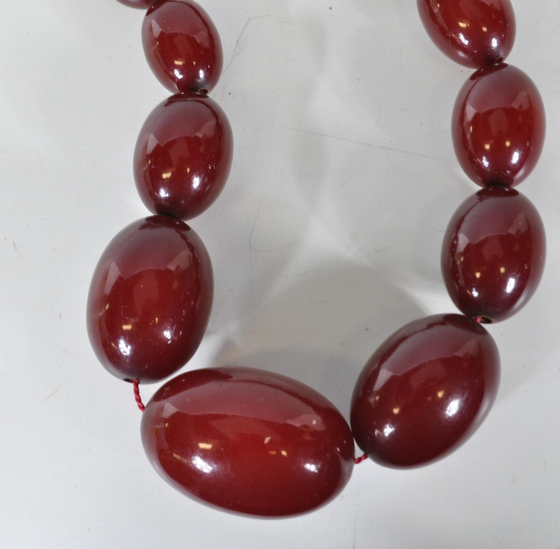 An early 20th Century cherry bakelite necklace con - Image 2 of 7