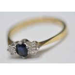 18CT GOLD SAPPHIRE & DIAMOND THREE STONE RING