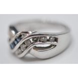 STAMPED 14CT WHITE GOLD CROSSOVER RING
