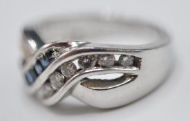 STAMPED 14CT WHITE GOLD CROSSOVER RING