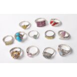 COLLECTION OF12 STAMPED .925 SILVER RING