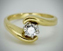 An 18ct Gold & Diamond Solitaire Crossover Ring