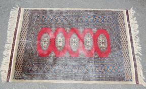 20TH CENTURY PERSIAN ISLAMIC BALUCH RUG.