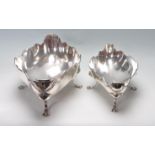 TWO ANTIQUE SILVER MATCHING FOOTED DISHES