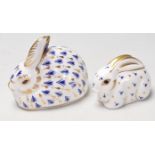 TWO ROYAL CROWN DERBY RABBIT PAPERWEIGHTS WITH GOLD STOPPERS