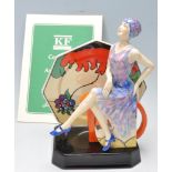 KEVIN FRANCISE TEA WITH CLARICE CLIFF FIGURINE