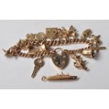 9CT GOLD HEART LOCK CHARM BRACELET