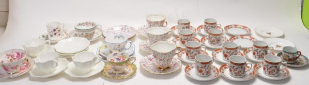 COLLECTION OF VINTAGE TEA CUPS AND SAUCERS