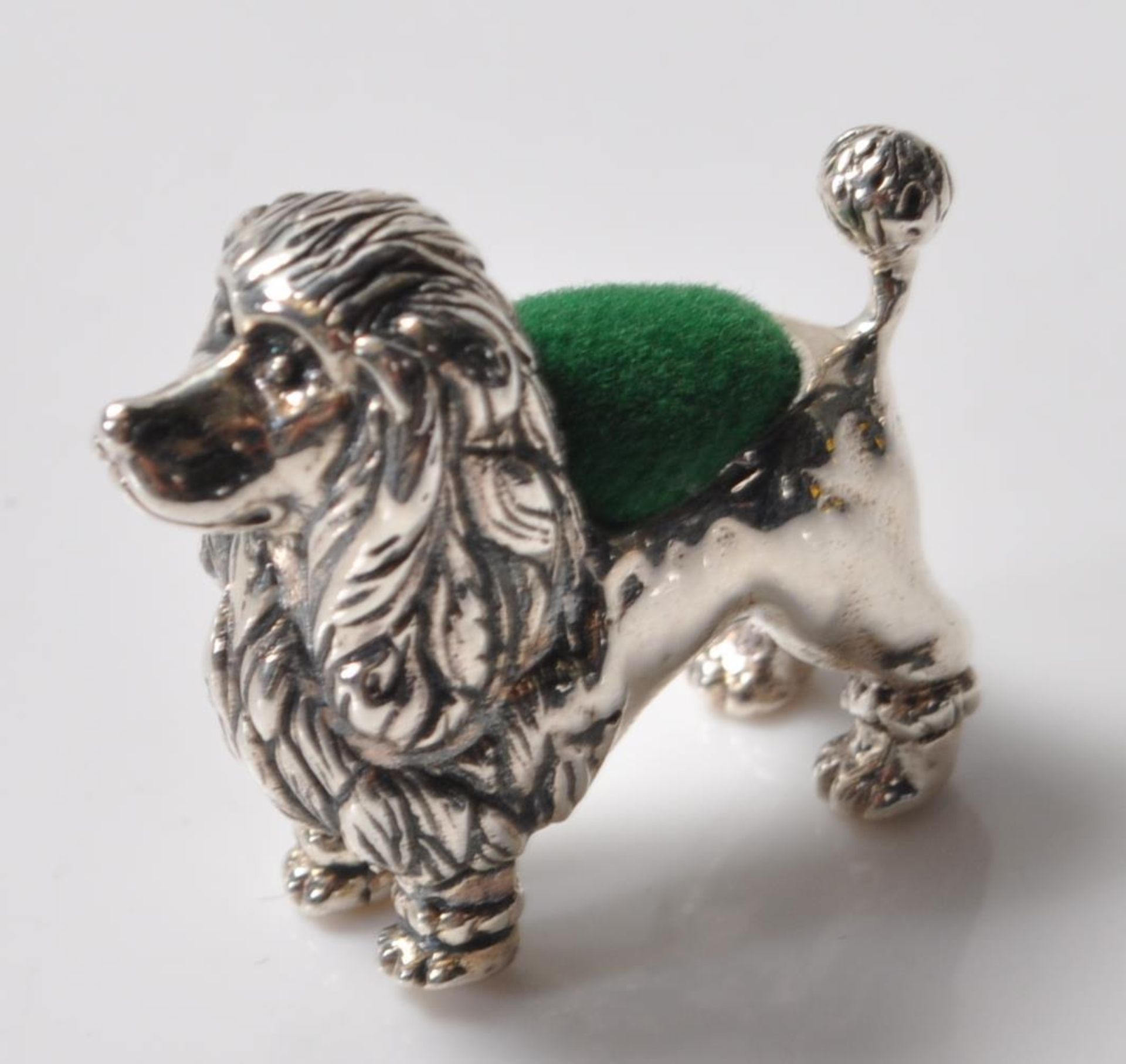 STAMPED 925 SILVER PIN CUSHION IN THE FORM OF A POODLE.