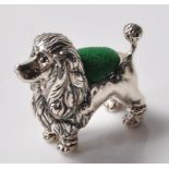 STAMPED 925 SILVER PIN CUSHION IN THE FORM OF A POODLE.