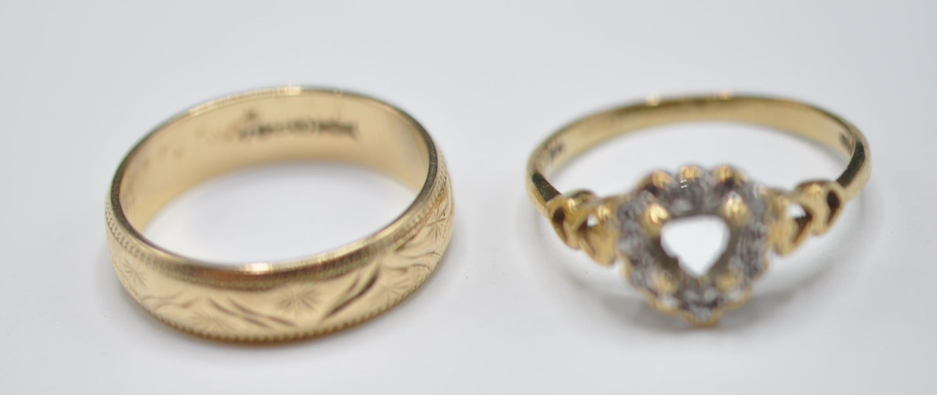 TWO 9CT GOLD RINGS INCLUDING ONE SET WITH DIAMONDS