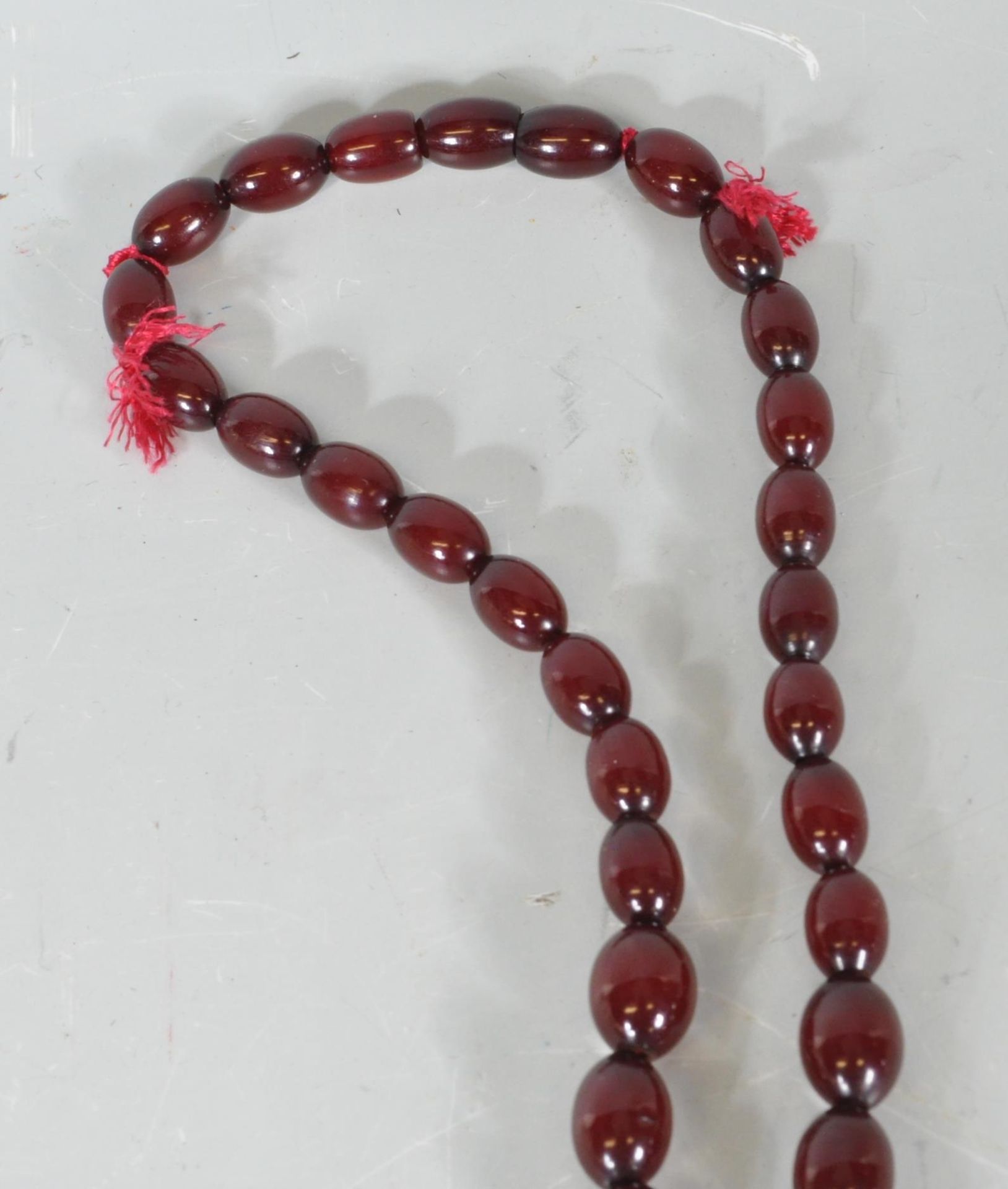 An early 20th Century cherry bakelite necklace con - Image 5 of 7