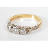 18CT GOLD AND DIAMOND THREE STONE RING