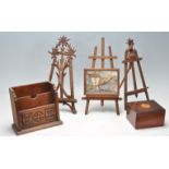 THREE 2OTH CENTURY MINIATURE WOODEN EASEL STANDS
