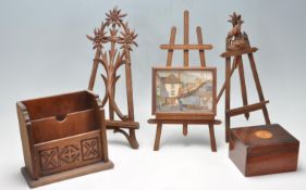 THREE 2OTH CENTURY MINIATURE WOODEN EASEL STANDS