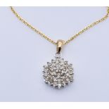 GOLD AND DIAMOND CLUSTER PENDANT NECKLACE