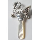 STAMPED STERLING SILVER BABIES RATTLE IN THE FORM OF A SWAN.