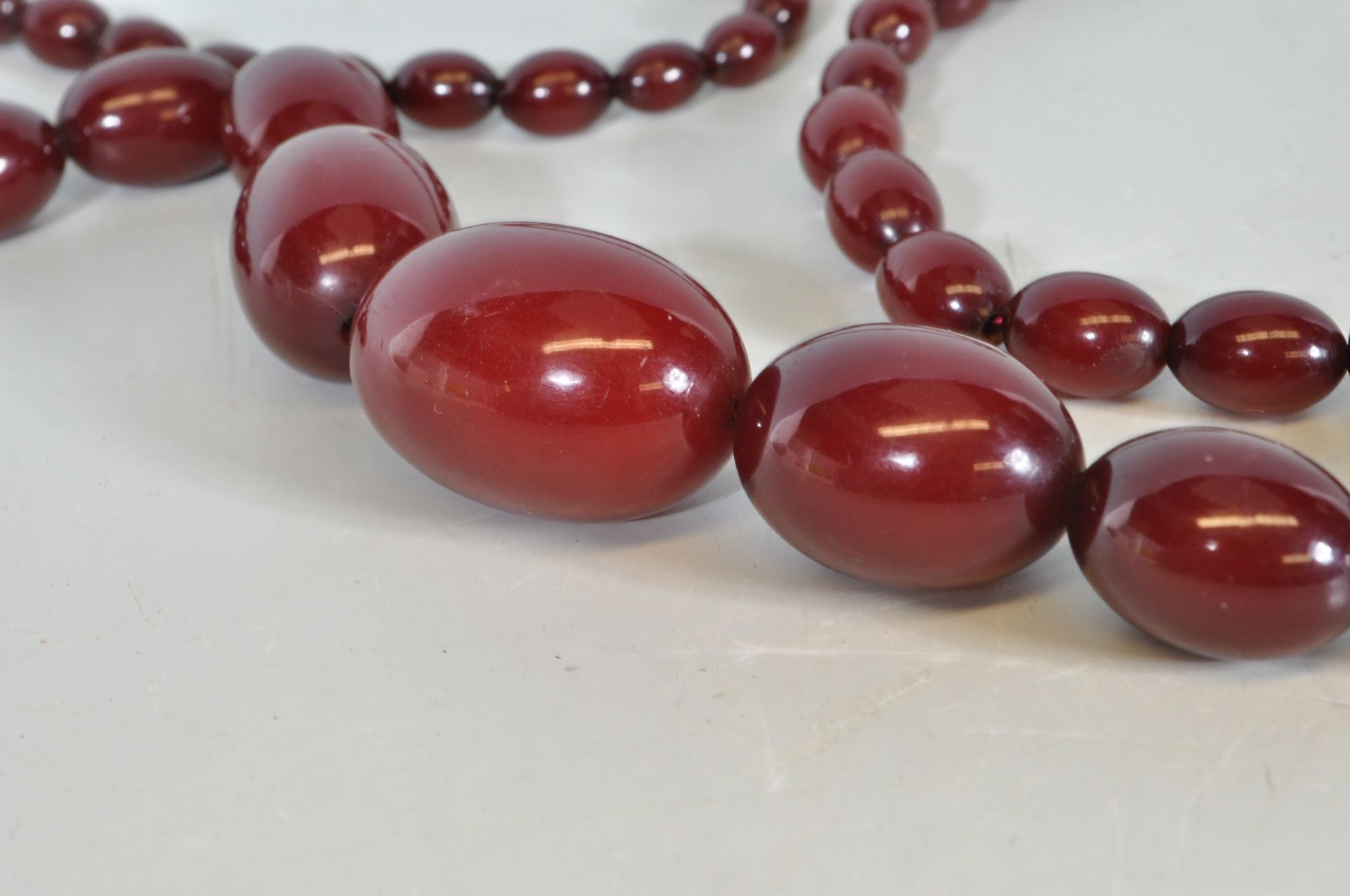 An early 20th Century cherry bakelite necklace con - Image 6 of 7