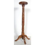 20TH CENTURY CARVED OAK TALL JARDINIERE