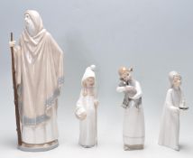 FOUR PORCELAIN LLADRO FIGURINES