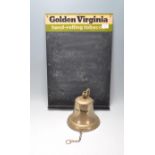 A RETRO VINTAGE GOLDEN VIRGINIA ADVERTSING BLACKBOARD AND BAR BELL.