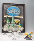 SET OF SIX RETRO BABYCHAM GLASSES AND AN ADVERTISING MIRROR.