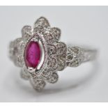 9CT WHITE GOLD PINK STONE AND DIAMOND RING