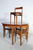 MANNER OF FREM ROJLE ROUNDETTE EXTENDABLE DINING TABLE AND CHAIRS