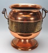 LARGE 20TH CENTURY BRASS AND COPPER TWIN HANDLED URN