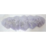 A LARGE RETRO VINTAGE LATE 20TH CENTURY PURPLE SHEEPSKIN RUG