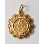 1911 GOLD HALF SOVEREIGN IN 9CT GOLD MOUNT