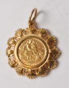 1911 GOLD HALF SOVEREIGN IN 9CT GOLD MOUNT
