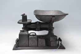 VINTAGE MID 20TH CENTURY EBONISED CAST IRON WEIGHING SCALES