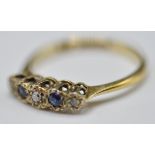 18CT GOLD AND PLATINUM DIAMOND AND BLUE STONE RING