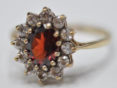 9CT GOLD RED AND WHITE STONE CLUSTER RING