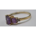 9CT GOLD AND PURPLE STONE RING